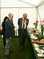 The Mayor is impressed by the exhibits.